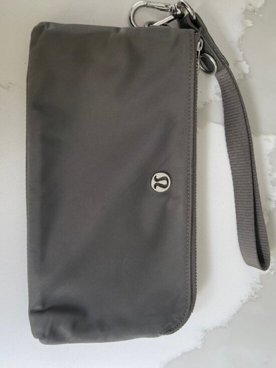 Lululemon Handbags - Lululemon Curved Wristlet in the highly sought-after Grey Sage neutral tone.